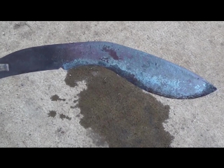 Blacksmith forging a kukri knife from a lawnmower blade with no power tools